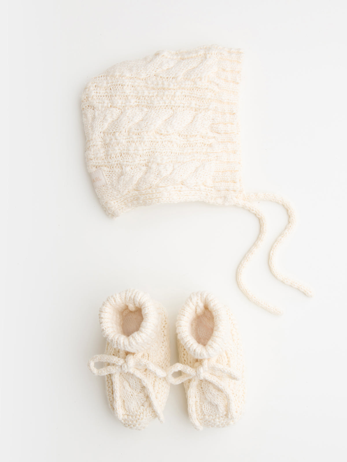 Cable Knit Bonnet in Ecru